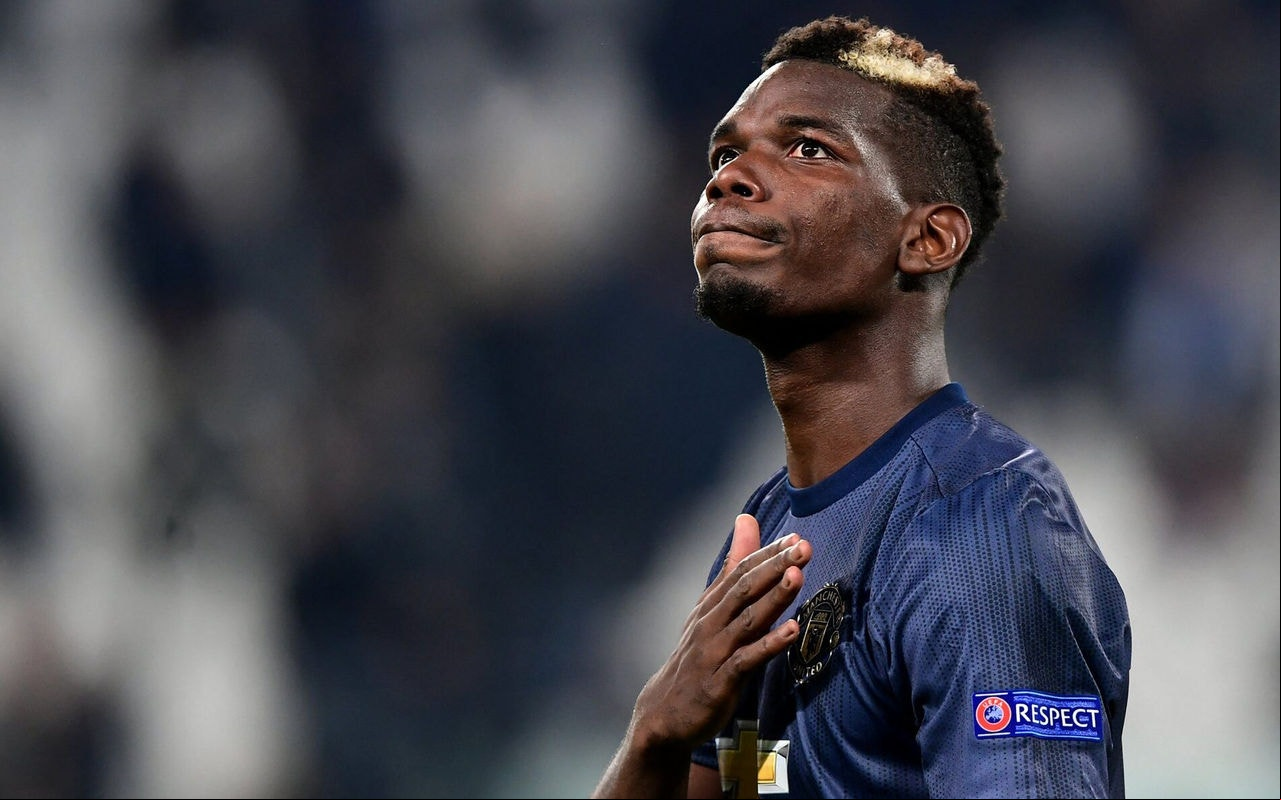 Pogba em jogo pelo Manchester United, na temporada 2018/2019 (Foto: Miguel Medina/AFP)
